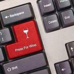 a keyboard with a red button that says press for wine