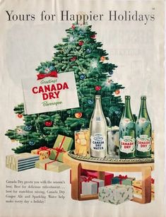 an old advertisement for canada dry with christmas trees and presents on the table next to it