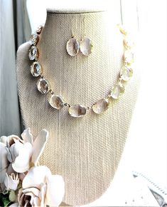 "This Anna Wintour style, clear crystal rhinestones and gold plated settings statement necklace is like a cool clear sunshine day that you can wear around your neck. Each beautiful piece is made here in my studio and made to last a lifetime. Each crystal is hand set and hand linked with high quality findings. These are new, sparkling cut crystals. Your choice of settings in gold or antiqued silver. Adjustable from 16 to 18\" It's Beautiful for layering as in the photos. These crystals are 18x13m Anna Wintour Style, Light Blue Necklace, Opal Drop Earrings, Blue Statement Necklace, Georgian Jewelry, Edwardian Jewelry, Beaded Necklace Designs, Yellow Necklace, Crystal Necklaces