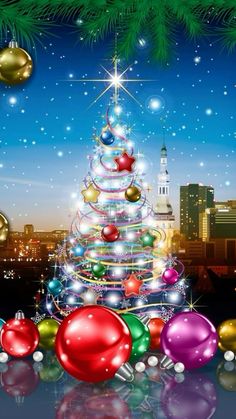 a christmas tree with ornaments and lights in front of a cityscape at night