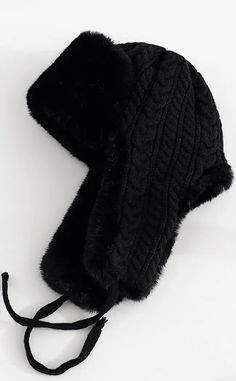 Whether you call these bad boys trapper hats, Russian hats, earflap hats or trooper hats - we know one thing - they warm AF! Keep your head wintergoth cosy in this faux fur woolly hat with extended earflaps on the side and woven black ties. A cable knit pattern on the back gives some granny chic glam and the fur shows on the underside of the sides and along the top brim One size fits most. Warm Hats With Ear Flaps For Cold Weather, Warm Winter Hats With Ear Flaps, Winter Outdoor Bonnet With Ear Flaps, Warm Bonnet With Ear Flaps For Winter, Warm Winter Bonnet With Ear Flaps, Warm Bonnet With Ear Flaps For Cold Weather, Windproof Winter Hats With Ear Flaps, Winter Beanie With Ear Flaps, Warm Beanie With Ear Flaps For Winter