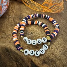 Beaded “Hocus Pocus” Bracelet Set A Mix Of Orange, Black, Purple & White Bracelet Stack Set Of 2 Stretchy With Heishi Clay Beads One Size Fits Most * Best Wear Tip: Slide Stretchy Beaded Bracelets Over Hand And Arm For Longest Wear And To Prevent Breakage. *Pair With Our Selection Of Sweet Stacks. Bracelet Stack Handmade Jewelry Boho Jewelry Sweet Stacks Bohemian Styles Jewelry For Her Personalized Jewelry Bracelets Chunky Bracelets New To Posh? Download The Free App & Use Our Code “Sweetstacks” Fall Pony Bead Bracelets, Hocus Pocus Bracelet Ideas, Hocus Pocus Bracelet, Halloween Clay Bead Bracelet, Halloween Beaded Bracelet, Baby Bbq, Halloween Sleepover, Bracelet Business, Football Bracelet