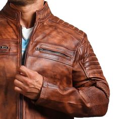 Café racer brown leather jacket comes with quilted and padded shoulders with zipper pockets. This brown biker jacket is hand-waxed and manufactured using 100% cowhide leather. Material: Genuine Leather Inner: Viscose Color: Brown Zipper: YKK Size: XS - 5XL NOTE: The size-chart is in accordance with the actual chest size of a person, for-example: XS is suitable for the person having chest size 37-38 Inches (94-97 cm). Distressed Brown Moto Leather Jacket, Brown Cafe Racer Biker Jacket For Biker Events, Distressed Brown Biker Outerwear For Events, Classic Brown Leather Motorcycle Jacket, Brown Cafe Racer Leather Jacket For Motorcycling, Brown Leather Cafe Racer Jacket For Motorcycling, Vintage Brown Biker Jacket For Motorcycling, Cafe Racer Style Brown Leather Jacket For Motorcycling, Cafe Racer Brown Leather Jacket For Motorcycling