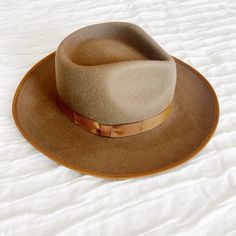 Gigi Pip Monroe Rancher Felt Fedora Hat. Size: 55 Xs Color: Brown New Without Tags. The Monroe Rancher Is A Hat With A Teardrop Shaped Crown, Stiff Upturned Brim, And Is Paired With A Tonal Grosgrain Band. These Beautiful Combinations Make This Felt Fedora Hat A Classic. Product Details 100% Soft Australian Wool. Teardrop Rancher Crown. Classic Crown Height. Stiff Medium Upturned Brim. Grosgrain Trimmed Brim. Coordinating Grosgrain Band Included. Great Sun Protection. Casual Solid Hat Bands With Flat Crown, Winter Brown Hat Bands For Flat Crown, Casual Brown Fedora With Flat Crown, Spring Brown Wool Hat, Retro Brown Hat Bands For Winter, Brown Hat Bands For Fall, Brown Winter Fedora One Size Fits Most, Winter Brown Fedora One Size Fits Most, Brown Hat With Flat Crown, One Size Fits Most