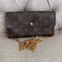 Monogram Long Bifold Wallet. Very Good Condition. Please Check Corners, Show A Little Wear, No Peeling On Inside. Crossbody Chain Included To Use As A Little Purse. Date Code Is There But Hard To Get A Clear Picture. Hard To Get, Bifold Wallet, Louis Vuitton Bag, Bag Lady, Louis Vuitton, Monogram, Purse, Wallet, Chain