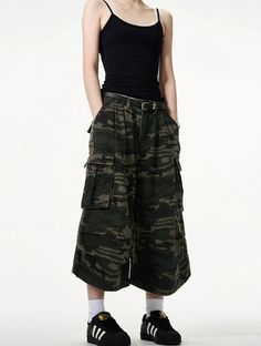 Embrace a fierce combination of style and practicality with our Camo Bermuda Capri Cargo Shorts. 

These high-waisted shorts feature a classic camouflage print, expertly crafted from a durable blend of materials for lasting comfort. The loose fit promotes freedom of movement while the integrated belt adds a functional, fashionable touch. 

Pair with a simple tee and sneakers for a laid-back look, or dress them up with a sleek blouse and ankle boots for a more sophisticated angle. Perfect for a v Bermudas Cargo, Clothing Styles Aesthetic, Big Shorts, Unique Clothing Style, Underground Streetwear, Camo Cargo Shorts, Outfit Shorts, Simple Tee, Simple Tees