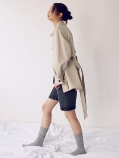 This is a belted trench coat with a three-dimensional silhouette. The voluminous raglan sleeves provide a casual yet feminine atmosphere, and the belt detail allows for a slimmer silhouette. It is an essential item that has a casual yet feminine vibe and can be worn with a variety of outfits.- Made of high-density cotton material with a luxurious appearance and soft feel.- Pockets on both sides for practical use- Open and close using buttons that match the design- Tuck on the back creates a voluminous silhouette*The color of the product may differ from the actual color depending on the monitor resolution. Gabardine Button-up Outerwear With Hidden Button Closure, Long-sleeve Gabardine Outerwear With Hidden Button Closure, Belted Trench Coat, Raglan Sleeve, Cotton Material, Trench Coat