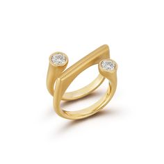 Carelle Whirl transforms the City’s energy and rhythm into chic essentials designed to navigate everyday twists and turns with an elevated sense of style and sophistication. This 18-karat yellow gold spotlight ring encircles the finger, showcasing two standout diamonds. Product Details Diamonds: 0.62ct GH-VS color and clarity Metal: 18kt yellow gold, Carelle signature Matte finish Modern Twist Yellow Gold Bypass Ring For Formal Occasions, Modern Rings With Timeless Round Cut Design, Modern Twist Yellow Gold Bypass Ring, Formal Yellow Gold Bypass Ring With Tension Setting, Modern Twist 14k Gold Bypass Ring For Formal Events, Modern 14k Gold Bypass Ring For Formal Occasions, Modern 14k Gold Rings For Everyday Luxury, Modern Yellow Gold Bypass Ring For Wedding, Modern Yellow Gold Bypass Wedding Ring