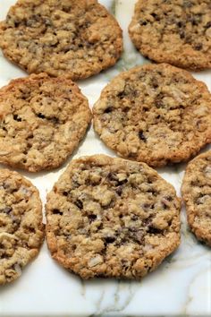 several cookies sitting on top of a white counter