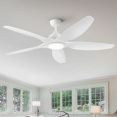 a white ceiling fan in a living room