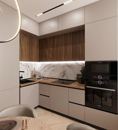 a modern kitchen with marble counter tops and wooden flooring, along with white cabinets