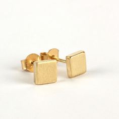 Modern and minimalist everyday 14k gold stud earrings. These thick small handmade squares are made of yellow 14k solid gold, and are delicately scratched with shiny edges. Chic and beautiful earrings you will enjoy wearing all day long. Squares size is approx 5.5 x 5.5 mm, and they are 1.6mm thick 14k solid gold ear nuts are included. * The earrings will be packed in a gift box ready to give as a gift, and shipped via Express mail service which usually takes 5-8 business days to arrive. * If you Minimalist 14k Gold Rectangular Earrings, Rectangular Yellow Gold Earrings For Everyday, Yellow Gold Rectangular Earrings For Everyday, Everyday Rectangular Yellow Gold Earrings, Minimal Stud Earrings, Minimal Earrings Studs, Earrings Square, Earrings Minimal, Square Stud Earrings