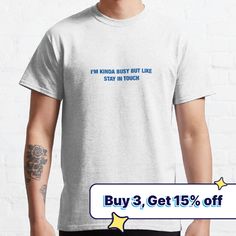 a man wearing a t - shirt that says i'm kinda busy but like stay in touch buy 3 get 15 % off