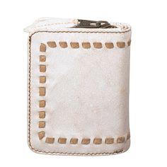 Experience the luxurious full grain leather of the Cremello Soni Wallet, with an irresistible crackled texture that reveals a soft tanned suede underneath. The buck stitch and threaded accents also showcase this supple suede, while distressed hardware adds the perfect touch to any outfit. Elevate your style with this must-have accessory. Features Soft, genuine leather exterior Zip around closure 1 interior id slot, 3 interior card slots; 1 zip coin/cash with divider 3.5" W X 4.5" H X 1" D Pendleton Pillow, Pendleton Throw, Horse Hair Bracelet, Hair Bracelet, King Size Blanket, Pendleton Blanket, Queen Size Blanket, Native American Bracelets, Upcycled Bag