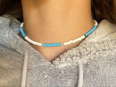 The golden palm Trendy Blue Beaded Choker, Trendy White Choker For Gift, Casual Blue Beaded Choker, Trendy Adjustable Blue Choker, Casual Blue Choker As Gift, Casual Blue Choker Gift, Casual Blue Choker For Gift, Trendy Blue Choker Necklace, White Casual Choker Necklace