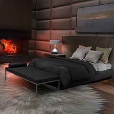 a large bed sitting next to a fire place in a room with fur on the floor