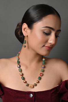 Handpainted Stone Beaded Necklace, Gold Plated Meenakari Jade Beaded Necklace, Laying Necklaces Anniversary Gifts for Mom, Office Jewelry This necklace is a most elegant and perfectly crafted necklace to bejewel your neckline with dancing beads that will create a style statement wherever you go. Pair this gorgeous replica of Western jewelry with your ethnic or contemporary ensembles and create a look to remember. * Necklace Length: 17 Inches (comes with adjustable Lock) * Earrings Length: 1 inch approx * Material: Brass and stone * Package: Necklace And Earring  STYLE TIP: The elegant design with oodles of pearls will keep you hooked every time you look at them. This lovely set is made for a modern-day woman who has her heart in the little details of her traditional heritage. A perfect mat Festive Multicolor Gemstone Beads Jewelry, Multicolor Gemstone Bead Necklaces For Festive Occasions, Multicolor Spiritual Kundan Necklace For Festivals, Festive Multicolor Gemstone Bead Necklaces, Traditional Multicolor Jewelry With Gemstone Beads, Green Beaded Bohemian Kundan Necklace, Traditional Multicolor Gemstone Beads Jewelry, Artistic Jewelry For Jewelry Making And Festivals, Traditional Multicolor Beads For Celebration