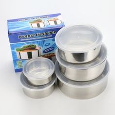 six stainless steel containers with lids on white surface next to box for protect fresh boxes