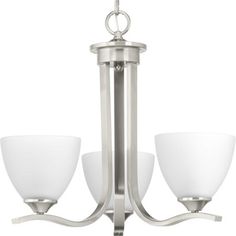 a chandelier with three white glass shades on the bottom and one light in the middle