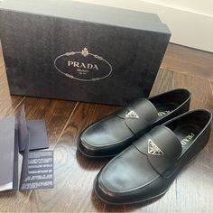 Brand New Never Worn Prada Shoes Size 10. Black Luxury Black Dress Shoes With Branded Heel, Designer Black Loafers With Removable Insole, Prada Shoes Men, Brown Suede Loafers, Logo Shoes, Buckle Loafers, Slipon Shoes, Leather Loafer Shoes, Patent Leather Loafers