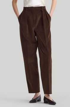 Tailored from plush corduroy, these tapered-leg pants feature reversed front pleats that create a relaxed fit. 27" inseam; 15" leg opening; 13" front rise; 16 1/2" back rise (size 42FR) Zip fly with button closure Front slant pockets; back button-welt pockets 100% cotton Dry clean Made in Italy Designer Clothing Corduroy Ankle-length Workwear Bottoms, Corduroy Tapered Leg Pants For Work, Tapered Leg Corduroy Pants For Work, Corduroy Tapered Leg Bottoms For Work, Corduroy Ankle-length Workwear Pants, Corduroy Ankle-length Pants For Work, Ankle-length Corduroy Pants For Work, Elegant Corduroy Bottoms For Work, Classic Corduroy Pants For Work