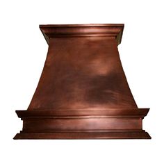 an old fashioned copper range hood on a white background