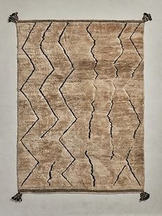 an old rug with wavy lines on it