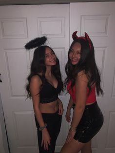 two young women dressed up in devil costumes