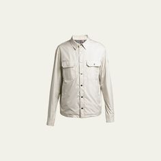 Moncler "Piz" overshirt in polyester with shiny silvertone hardware Point collar Snap front closure Two chest flap pockets Long sleeves Adjustable snap cuffs Dry clean Made in Romania