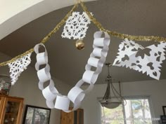 some paper chains are hanging from the ceiling