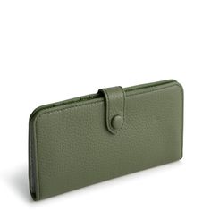 Meet our Tab Wallet, the perfect blend of style, functionality and organization. Crafted from high-quality materials, this spacious wallet offers ample room for your cards, cash, coins and more, keeping everything neatly organized and easily accessible. Whether you're running errands, heading to work or traveling, our wallet offers the perfect combination of functionality, durability and style to meet your everyday carry needs. Vera Bradley Tab Wallet in Green Versatile Trifold Wallet For Travel, Versatile Green Wallets With Rfid Blocking, Green Wallets With Interior Card Slots, Classic Green Trifold Wallet For Everyday Use, Everyday Green Wallets With Interior Card Slots, Everyday Rectangular Trifold Wallet With Snap Closure, Versatile Bifold Card Holder For Daily Use, Modern Office Clutch Wallet, Versatile Rectangular Coin Purse With Interior Card Slots