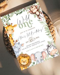 an animal themed birthday party with jungle animals and giraffes on the front