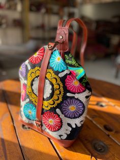 "Thank you for visiting our shop!! Suzani bag made by old Suzani fabric. Handmade embroidery Fabric \"Suzani\"come from Uzbekistan, we made bag at our atelier in Turkey. It's very unique style bag, If you change the position of hook, you can use as shoulder bag and as body bag.. also like backpack! Size : 36cm x 28cm x14cm Material : Suzani / leather Notice: * Because of the unique and handmade products measurements above may be differ a little bit from the real one. *Actual colors may slighly d Multicolor Bags With Traditional Patterns For Everyday Use, Traditional Multicolor Backpack For Travel, Traditional Multicolor Rectangular Backpack, Embroidered Rectangular Backpack, Embroidered Multicolor Backpack, Multicolor Embroidered Backpack, Traditional Travel Backpack, Traditional Handmade Rectangular Backpack, Traditional Rectangular Backpack For Travel