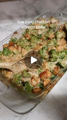 a casserole dish with chicken and broccoli in it on a table