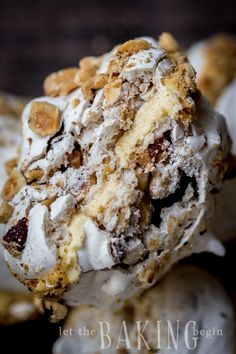 an ice cream sundae with nuts and raisins on top