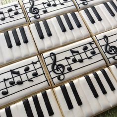 many decorated cookies with musical notes on them