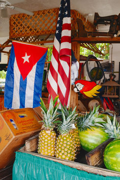 pineapples, watermelon and other fruit are on display