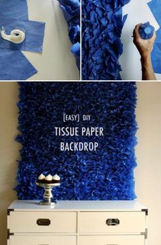 blue tissue paper is being used to make a backdrop for a dresser and wall decoration