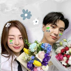 two people with flowers on their faces and one holding a bouquet in front of them