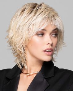 Hair Length: Fringe 3-4" | Crown 4-5.5" | Nape 4.5" Weight: 2.85 oz. A mid length shag with razor cut layers that brushes smooth or piecey. Special, pre-teased roots adds lift without any bulk. Our special pre-teased roots construction adds lift at the root without any of the bulk, our custom fitting Cool Comfort stretch cap. Cap for every day, all day comfort. | Razor Cut Shag | Synthetic Wig by TressAllure in 23R, Synthetic Hair, Medium Women's Wigs | Best Wig Outlet Mid Length Shag, Razor Cut Shag, Cut Layers, Wig Outlet, Best Wig Outlet, Shaggy Short Hair, Short Shag Hairstyles, Messy Short Hair, Choppy Hair