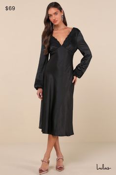 The Lulus Illustrious Elegance Black Satin Long Sleeve Midi Dress is stunning, sweet, and will sweep everyone off their feet! Sleek, stretch-woven satin shapes this stunning dress that features a lightly gathered bodice with a plunging, lace-trimmed V-neck and back, all framed by long balloon sleeves with matching lace trim and elastic at the cuffs. The chic, empire-style waist sits atop the fit-and-flare silhouette that falls to a modern midi hem. Hidden back zipper/clasp. Fit: This garment fit Satin Stretch Midi Dress, Stretch Satin Midi Dress, Fitted Silk Dress With Satin Finish And V-neck, Satin V-neck Night Dress, Stretch Bias Cut Dress For Night Out, Fitted Satin Knee-length Midi Dress, Fitted Satin Finish V-neck Slip Dress, Night V-neck Dress With Satin Finish, Glamorous Fitted Long Sleeve Satin Dress