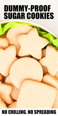 a bowl filled with cut up sugar cookies