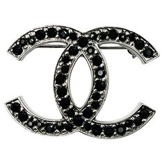 Chanel Classic Silver CC Black Crystal Brooch * Marked 12 * Made in France -It is approximately 1.5" x 1.1" -Very classic and pretty -In a pristine condition DDAB2152-00681DD Chanel Brooch Farfetch, Chanel Brooch, Crystal Brooch, Black Crystals, Coco Chanel, Chanel Classic, Made In France, Chanel, Crystals