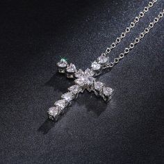 This Delicate Heart Crystal Cross Pendant necklace is classified as Fashion Jewelry or as Luxury jewelry, express elegant personal style. The Cross Pendant looks aesthetic, to give as a gift or wear on life's most precious days. Glistening Pendant is a classy and chic choice that goes with every complexion and adds a touch of beauty to every style. You can wear this Delicate Heart Crystal Cross Pendant Necklace on its own or partner with classic silhouettes for an express elegant personal style