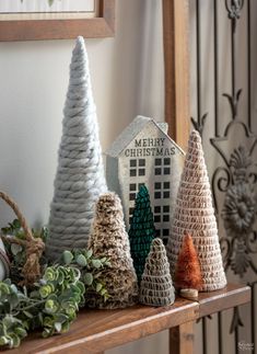 christmas decorations are displayed on a mantle in the living room