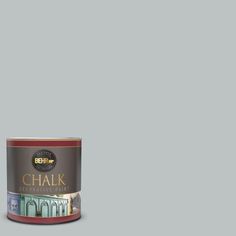 a can of chalk paint on a blue background