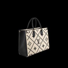 a white and black louis vuitton handbag on a black background with the word louis vuitton written across it