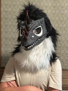 Furred dino mask with horns and complete hood *This product can also be made to order* Horned Masks And Prosthetics For Cosplay Events, Horned Masks For Cosplay And Fantasy Events, Dino Mask Ears, Dino Mask Ideas, Mask With Horns, Dino Masks, Dino Mask, Mask Accessories, Therian Mask