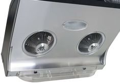 two exhaust fans mounted on the side of a silver wall mount heater with black trim