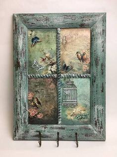 an old window with birds and flowers painted on it